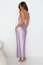 Parties In Spring: A soft pink satin maxi dress – a show-stopping outfit for parties.