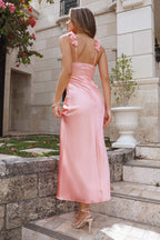 Parties In Spring: A soft pink satin maxi dress – a show-stopping outfit for parties.