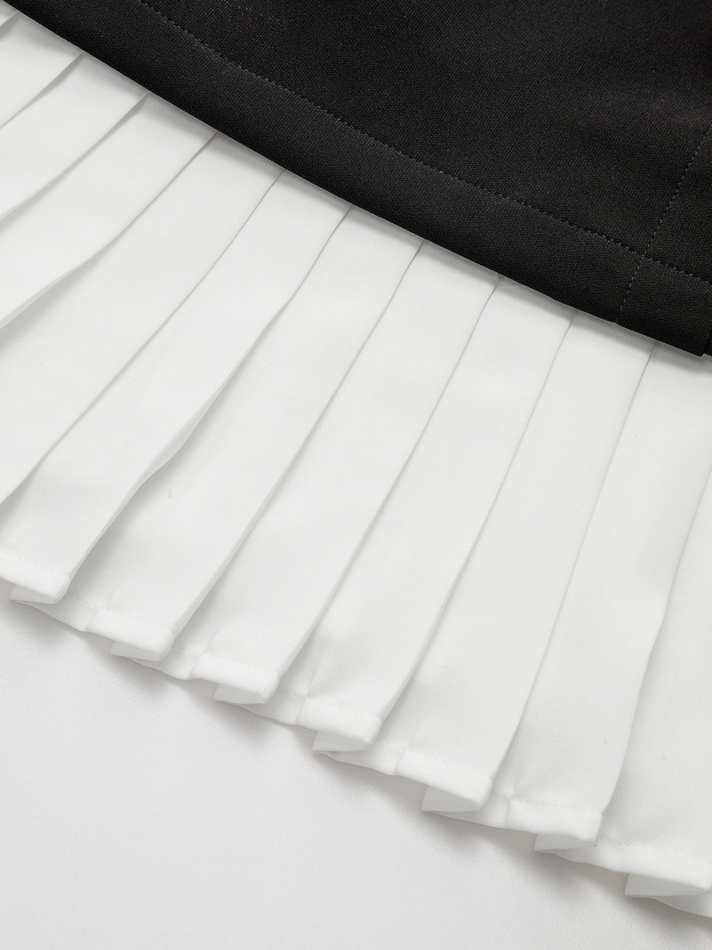 Pleated Hem Panel Asymmetric Metal Detail Mini Dress